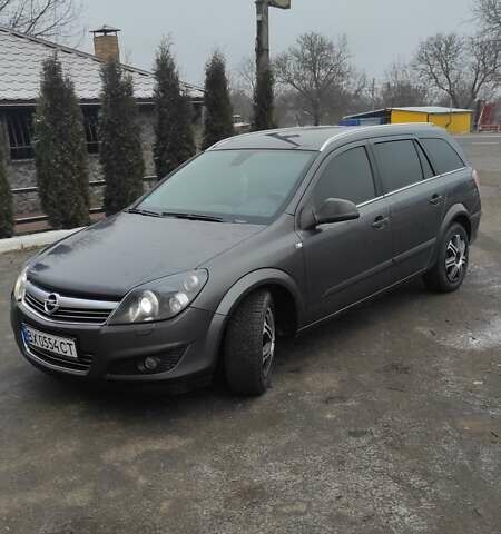 Серый Опель Астра, объемом двигателя 1.69 л и пробегом 210 тыс. км за 6300 $, фото 1 на Automoto.ua
