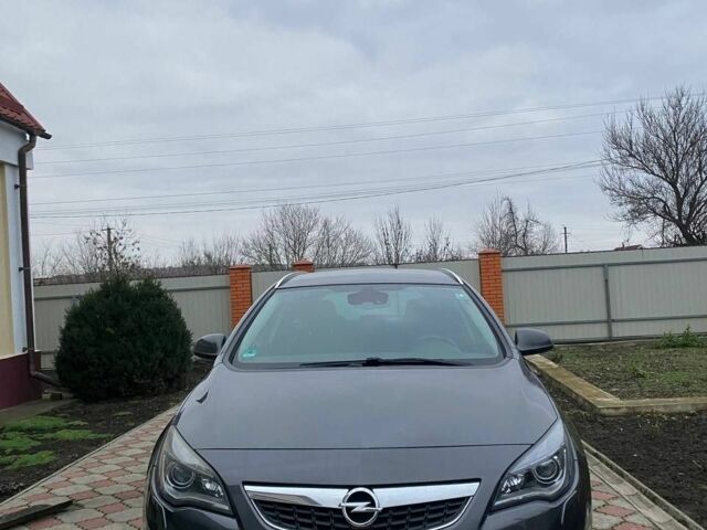 Серый Опель Астра, объемом двигателя 2 л и пробегом 245 тыс. км за 8850 $, фото 1 на Automoto.ua