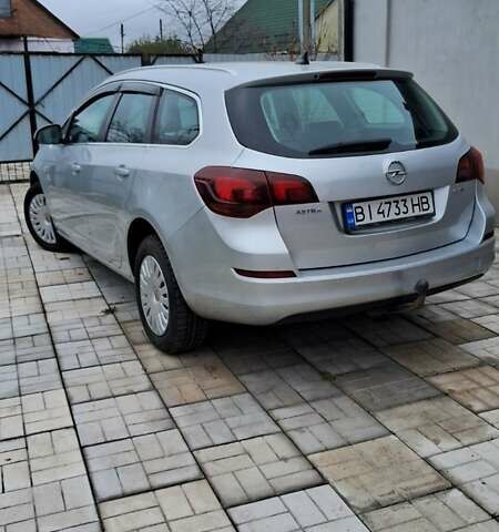 Серый Опель Астра, объемом двигателя 1.7 л и пробегом 266 тыс. км за 7500 $, фото 1 на Automoto.ua