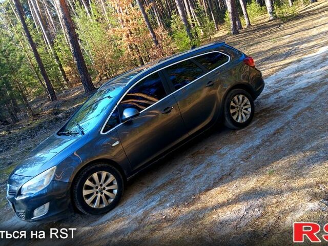 Серый Опель Астра, объемом двигателя 1.2 л и пробегом 220 тыс. км за 5200 $, фото 1 на Automoto.ua