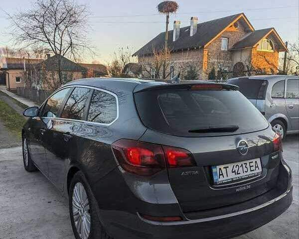 Серый Опель Астра, объемом двигателя 1.3 л и пробегом 264 тыс. км за 7300 $, фото 1 на Automoto.ua