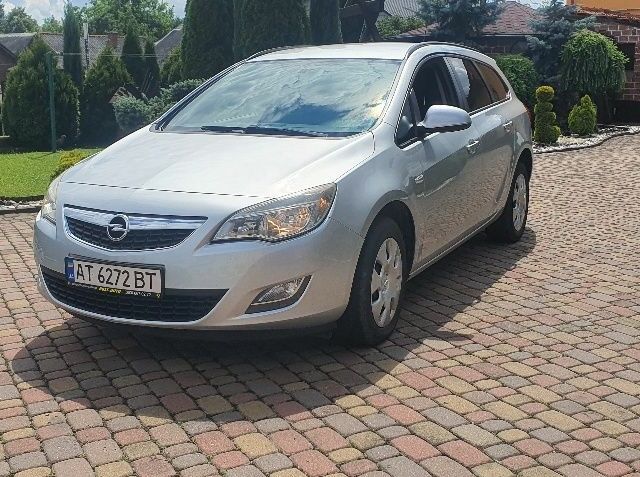 Сірий Опель Астра, об'ємом двигуна 1.2 л та пробігом 245 тис. км за 5350 $, фото 1 на Automoto.ua
