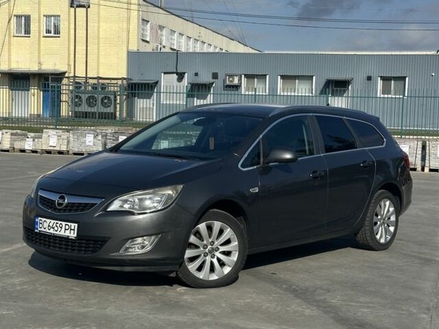 Серый Опель Астра, объемом двигателя 1.2 л и пробегом 238 тыс. км за 7500 $, фото 1 на Automoto.ua