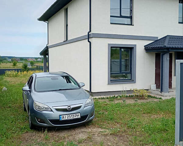 Серый Опель Астра, объемом двигателя 1.25 л и пробегом 300 тыс. км за 4200 $, фото 1 на Automoto.ua