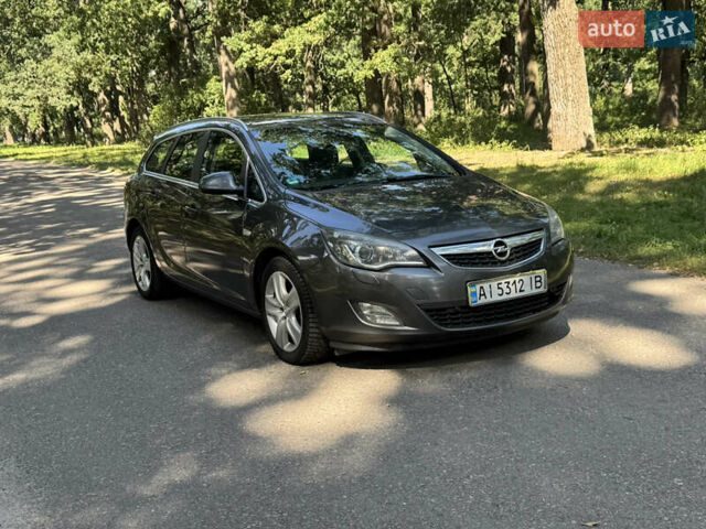 Сірий Опель Астра, об'ємом двигуна 1.69 л та пробігом 160 тис. км за 6000 $, фото 1 на Automoto.ua