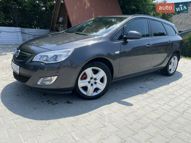 Серый Опель Астра, объемом двигателя 1.69 л и пробегом 243 тыс. км за 6400 $, фото 1 на Automoto.ua