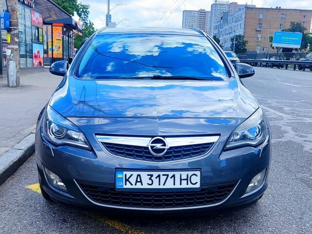 Серый Опель Астра, объемом двигателя 2 л и пробегом 250 тыс. км за 8800 $, фото 1 на Automoto.ua