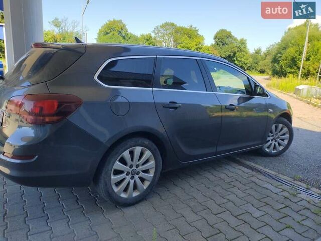 Серый Опель Астра, объемом двигателя 1.7 л и пробегом 177 тыс. км за 7208 $, фото 1 на Automoto.ua