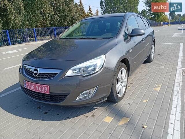 Серый Опель Астра, объемом двигателя 1.4 л и пробегом 183 тыс. км за 5900 $, фото 1 на Automoto.ua
