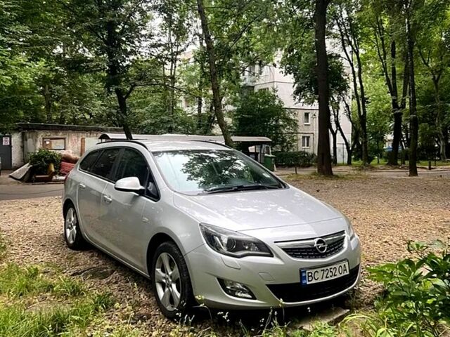 Сірий Опель Астра, об'ємом двигуна 2 л та пробігом 247 тис. км за 7600 $, фото 1 на Automoto.ua