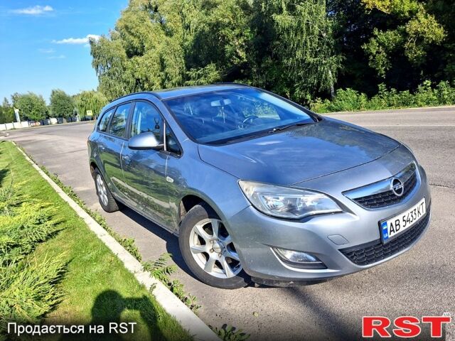 Серый Опель Астра, объемом двигателя 2 л и пробегом 300 тыс. км за 5900 $, фото 1 на Automoto.ua