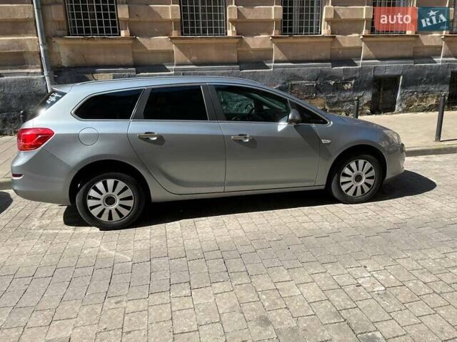 Серый Опель Астра, объемом двигателя 1.25 л и пробегом 247 тыс. км за 8400 $, фото 1 на Automoto.ua