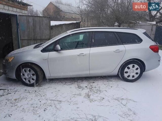 Сірий Опель Астра, об'ємом двигуна 1.7 л та пробігом 202 тис. км за 6500 $, фото 1 на Automoto.ua