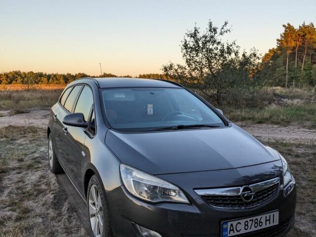 Серый Опель Астра, объемом двигателя 1.2 л и пробегом 261 тыс. км за 6500 $, фото 1 на Automoto.ua