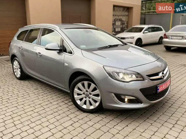 Серый Опель Астра, объемом двигателя 2 л и пробегом 240 тыс. км за 8299 $, фото 1 на Automoto.ua