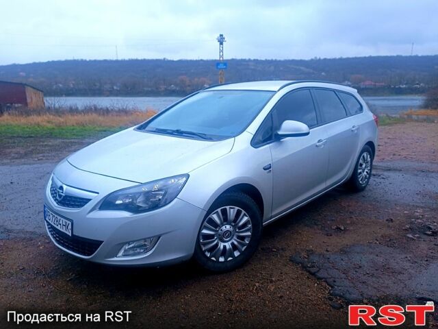 Сірий Опель Астра, об'ємом двигуна 1.7 л та пробігом 25900 тис. км за 6799 $, фото 1 на Automoto.ua