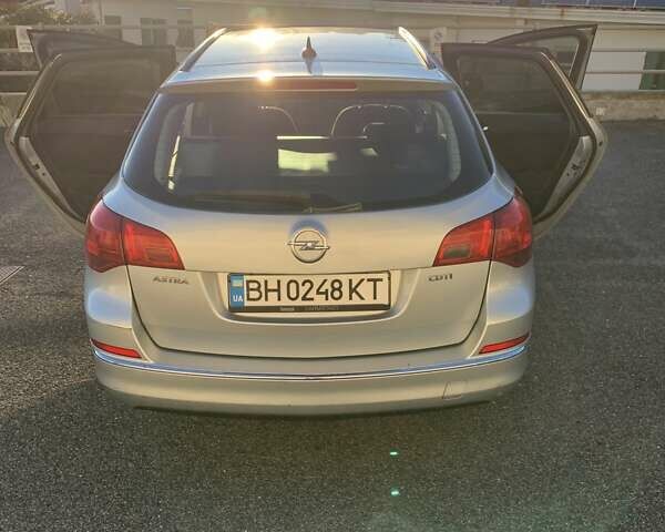 Сірий Опель Астра, об'ємом двигуна 1.69 л та пробігом 327 тис. км за 6700 $, фото 1 на Automoto.ua