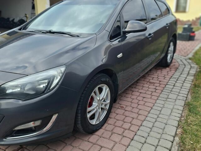 Серый Опель Астра, объемом двигателя 1.7 л и пробегом 214 тыс. км за 8499 $, фото 1 на Automoto.ua