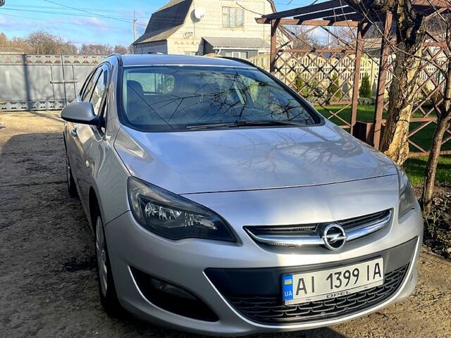 Серый Опель Астра, объемом двигателя 1.2 л и пробегом 230 тыс. км за 5600 $, фото 1 на Automoto.ua