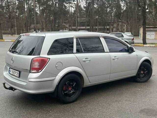 Серый Опель Астра, объемом двигателя 1.6 л и пробегом 235 тыс. км за 6299 $, фото 1 на Automoto.ua