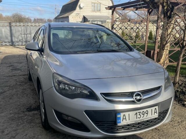 Серый Опель Астра, объемом двигателя 1.2 л и пробегом 230 тыс. км за 5600 $, фото 1 на Automoto.ua