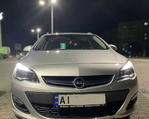 Серый Опель Астра, объемом двигателя 1.69 л и пробегом 213 тыс. км за 9400 $, фото 1 на Automoto.ua