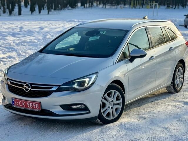 Сірий Опель Астра, об'ємом двигуна 1.6 л та пробігом 204 тис. км за 11119 $, фото 1 на Automoto.ua