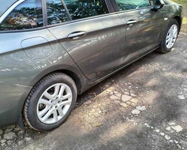 Сірий Опель Астра, об'ємом двигуна 1.6 л та пробігом 230 тис. км за 11200 $, фото 1 на Automoto.ua
