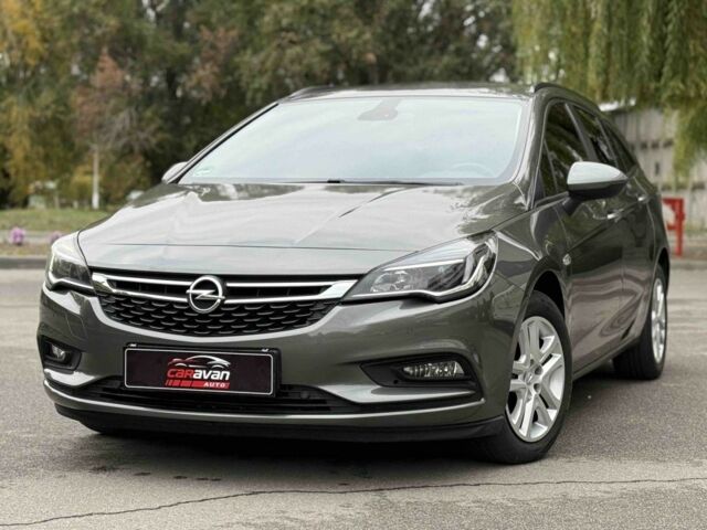 Серый Опель Астра, объемом двигателя 1.6 л и пробегом 157 тыс. км за 12199 $, фото 1 на Automoto.ua