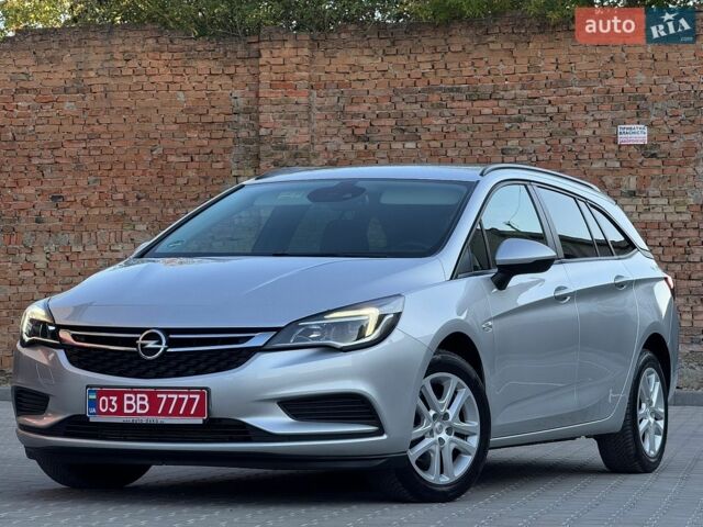 Сірий Опель Астра, об'ємом двигуна 1.6 л та пробігом 156 тис. км за 10999 $, фото 1 на Automoto.ua