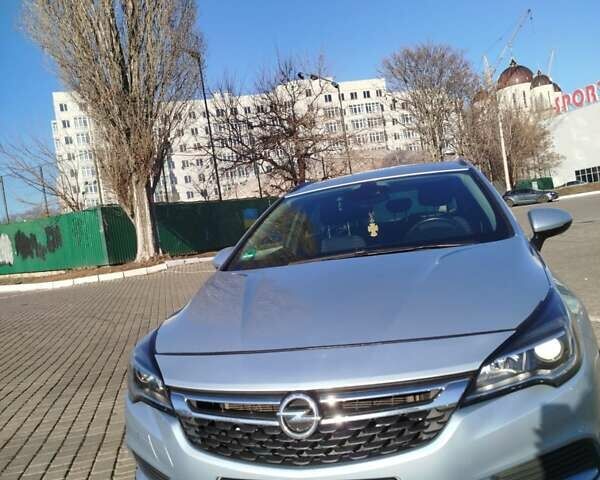 Серый Опель Астра, объемом двигателя 1.6 л и пробегом 165 тыс. км за 12950 $, фото 1 на Automoto.ua