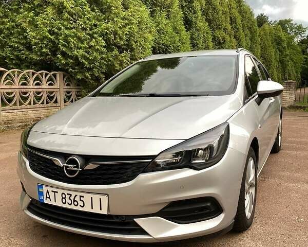 Серый Опель Астра, объемом двигателя 1.5 л и пробегом 115 тыс. км за 12599 $, фото 1 на Automoto.ua