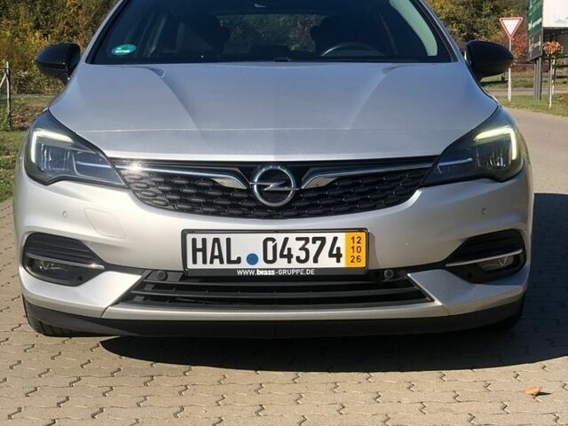 Сірий Опель Астра, об'ємом двигуна 1.5 л та пробігом 221 тис. км за 10000 $, фото 1 на Automoto.ua