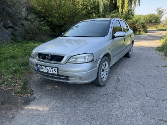 Серый Опель Астра, объемом двигателя 2 л и пробегом 230 тыс. км за 1555 $, фото 1 на Automoto.ua