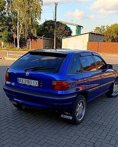 Синий Опель Астра, объемом двигателя 2 л и пробегом 300 тыс. км за 2000 $, фото 1 на Automoto.ua