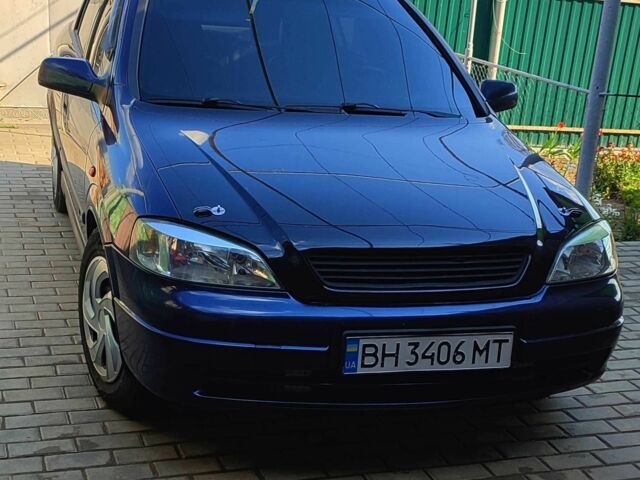 Синий Опель Астра, объемом двигателя 1.6 л и пробегом 300 тыс. км за 4000 $, фото 1 на Automoto.ua