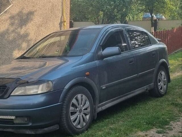 Синий Опель Астра, объемом двигателя 2 л и пробегом 300 тыс. км за 1900 $, фото 1 на Automoto.ua