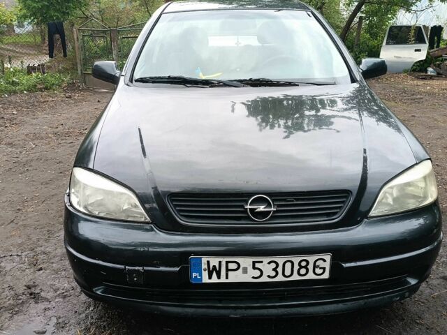 Синий Опель Астра, объемом двигателя 2 л и пробегом 306 тыс. км за 550 $, фото 1 на Automoto.ua
