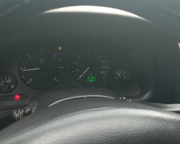 Синий Опель Астра, объемом двигателя 2 л и пробегом 312 тыс. км за 2700 $, фото 1 на Automoto.ua