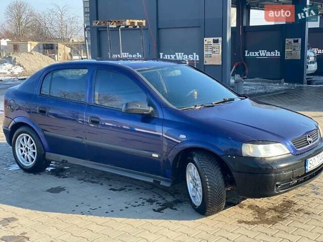 Синій Опель Астра, об'ємом двигуна 2 л та пробігом 200 тис. км за 1500 $, фото 1 на Automoto.ua