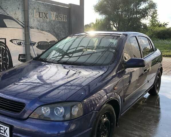 Синий Опель Астра, объемом двигателя 1.6 л и пробегом 270 тыс. км за 1650 $, фото 1 на Automoto.ua