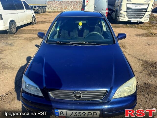 Синий Опель Астра, объемом двигателя 1.6 л и пробегом 217 тыс. км за 2400 $, фото 1 на Automoto.ua