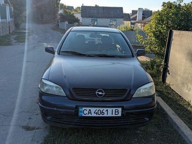 Синій Опель Астра, об'ємом двигуна 2 л та пробігом 320 тис. км за 1654 $, фото 1 на Automoto.ua
