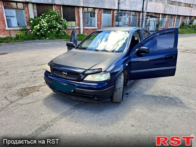 Синий Опель Астра, объемом двигателя 1.2 л и пробегом 300 тыс. км за 1700 $, фото 1 на Automoto.ua