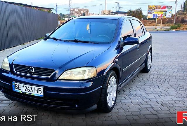 Синий Опель Астра, объемом двигателя 2 л и пробегом 330 тыс. км за 3550 $, фото 1 на Automoto.ua