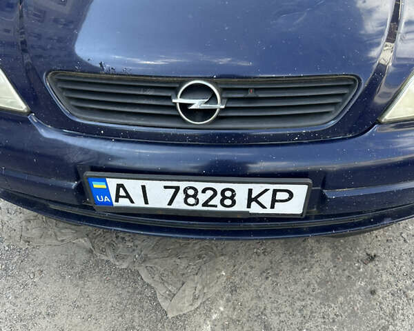 Синий Опель Астра, объемом двигателя 1.6 л и пробегом 370 тыс. км за 800 $, фото 1 на Automoto.ua