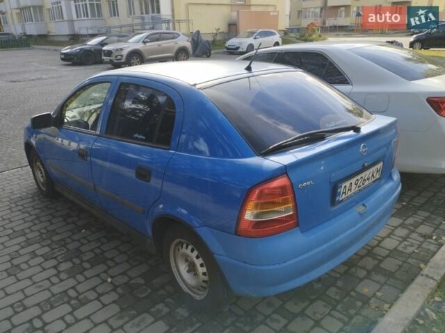 Синий Опель Астра, объемом двигателя 1.2 л и пробегом 303 тыс. км за 2500 $, фото 1 на Automoto.ua