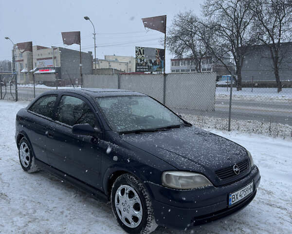 Синий Опель Астра, объемом двигателя 1.69 л и пробегом 320 тыс. км за 2200 $, фото 1 на Automoto.ua
