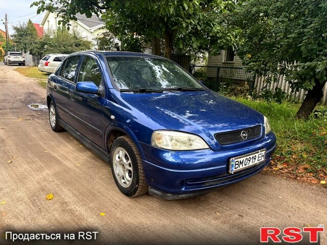 Синий Опель Астра, объемом двигателя 1.2 л и пробегом 218 тыс. км за 3180 $, фото 1 на Automoto.ua