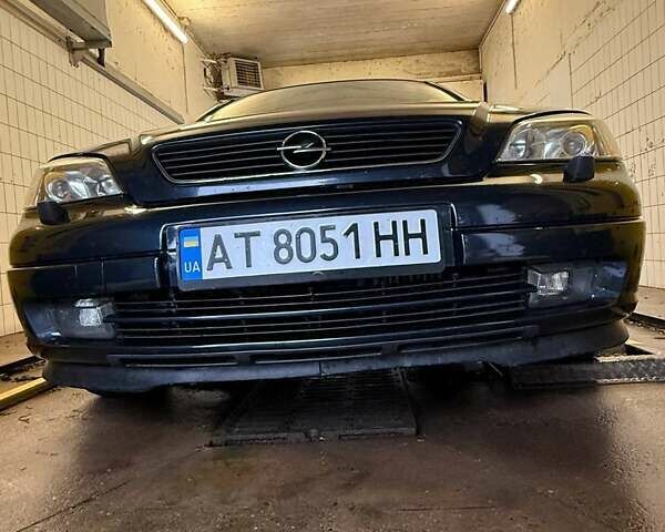 Синий Опель Астра, объемом двигателя 2 л и пробегом 230 тыс. км за 4731 $, фото 1 на Automoto.ua